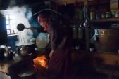 nun-in-kitchen-at-lungdang-gompa-_1.jpg
